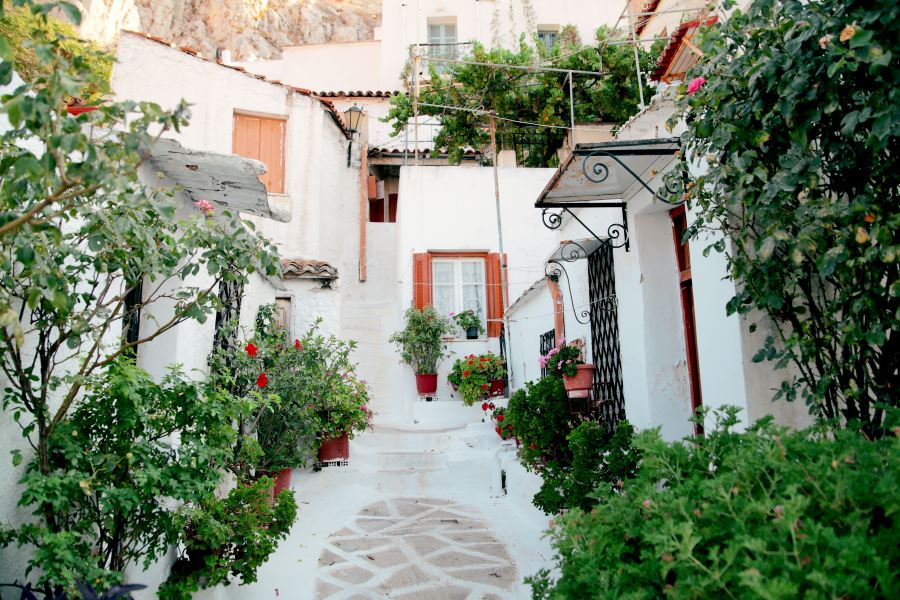 Take a stroll at the Plaka neighborhood in Athens